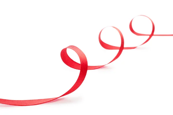 Red Christmas ribbon on white background — Stock Photo, Image