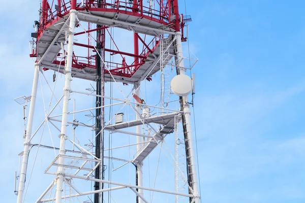 stock image Telecommunication tower agains blue sky background