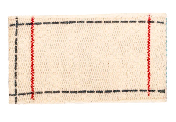 Etiqueta de telas en blanco atada con una cuerda — Foto de Stock