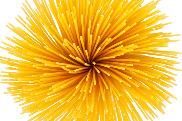 Bunch of spaghetti isolated on white. Top view. — Stock Photo, Image