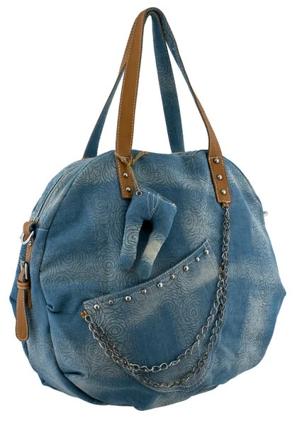 Женская сумка в синих джинсах на белом фоне — стоковое фото