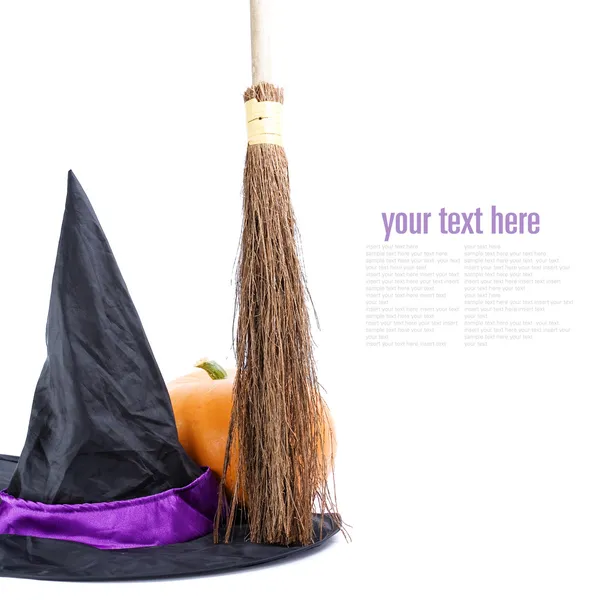 Witch broomstick and hat — Stock Photo, Image