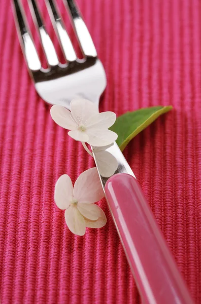 Fork and hydrangea flower — Stock Photo, Image