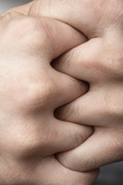 Male hands Combined together. Macro close-up. clipart