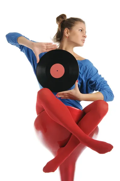 stock image Young woman with vinyl record