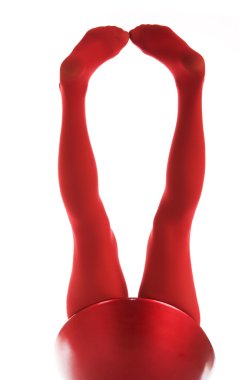 Female feet in red stockings isolated in white clipart