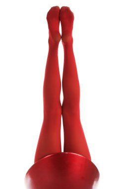 Female feet in red stockings isolated in white clipart