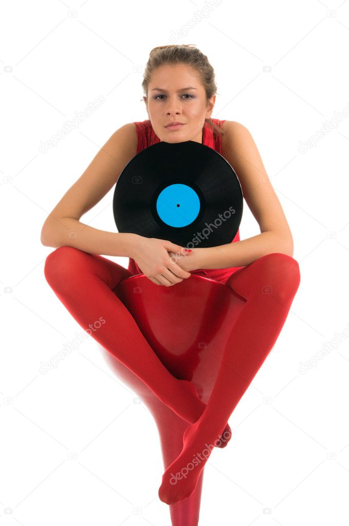 Young woman with vinyl records isolated in white