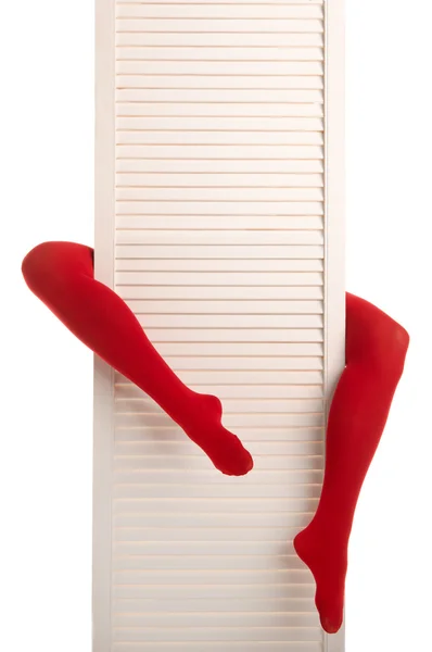 Женские Ноги Красных Чулках Белых Дверях — стоковое фото