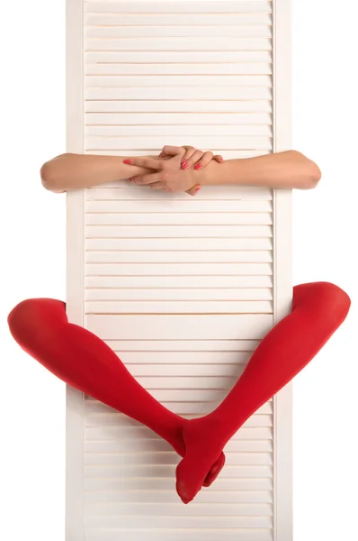 Frauenfüße Roten Strümpfen Händen Und Weißer Tür — Stockfoto
