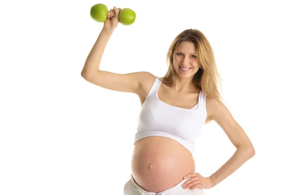 Беременная женщина, занимающаяся фитнесом — стоковое фото