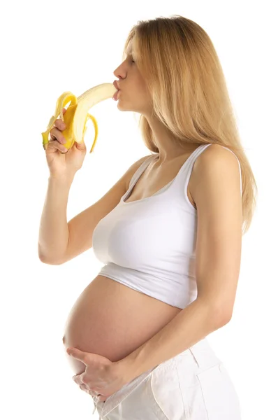 Беременная Женщина Сексуально Кусает Банан Изолированный Белом — стоковое фото
