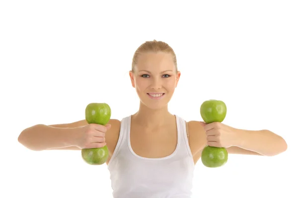 Γυναίκα που ασχολούνται με αλτήρες γυμναστήριο από μήλα — Φωτογραφία Αρχείου