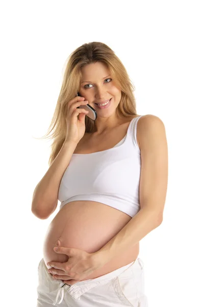 Szczęśliwa kobieta w ciąży z telefonu komórkowego — Zdjęcie stockowe