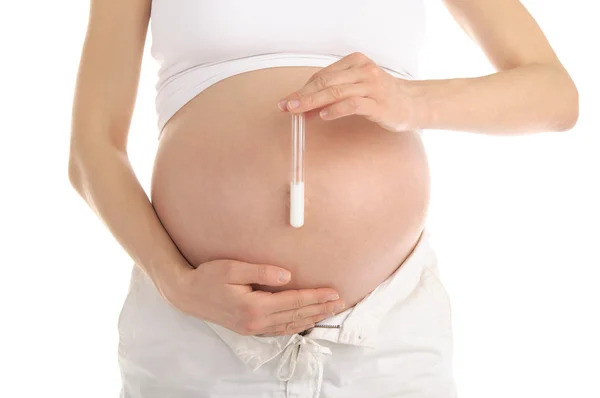 Mujer embarazada sosteniendo un tubo de ensayo con esperma —  Fotos de Stock
