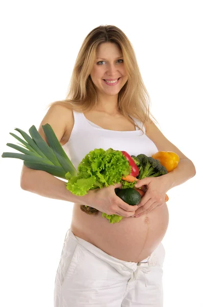 Ευτυχισμένη έγκυος γυναίκα με φρούτα και λαχανικά — Φωτογραφία Αρχείου