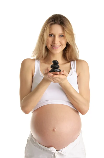 Těhotná žena s kameny — Stock fotografie