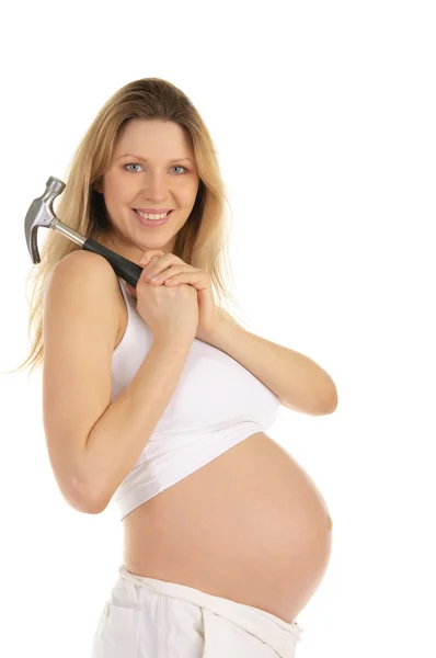 Bir çekiç ile mutlu bir hamile kadın — Stok fotoğraf
