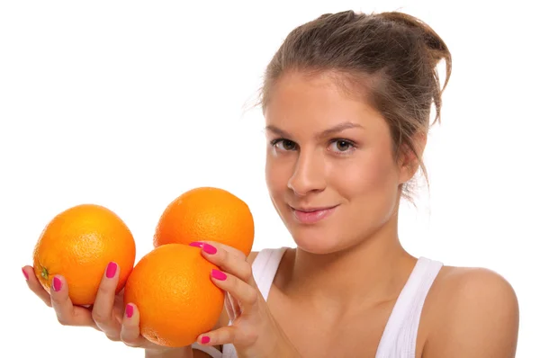 stock image Beautiful smiling woman with oranges