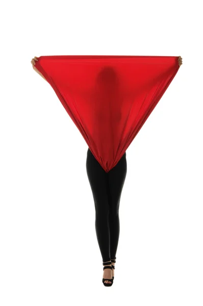 Mulher de calças pretas com um pano vermelho — Fotografia de Stock