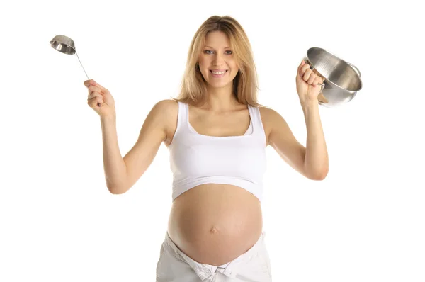 Šťastné těhotné ženy s kuchyňským nádobím — Stock fotografie