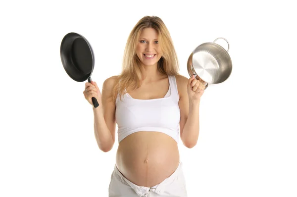 Glückliche schwangere Frau mit Kochutensilien — Stockfoto
