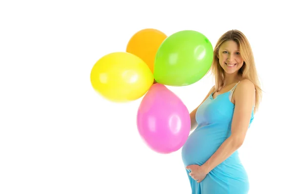 Mujer embarazada con globos de colores — Foto de Stock