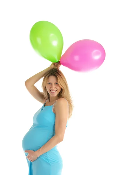 Kobieta w ciąży z kolorowych balonów — Zdjęcie stockowe
