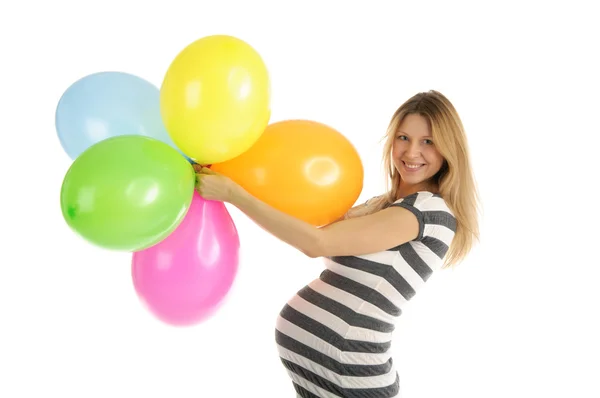 Mujer embarazada con globos — Foto de Stock