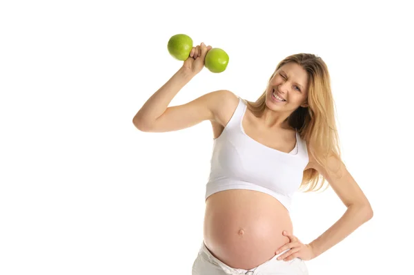 Беременная женщина, занимающаяся фитнесом — стоковое фото