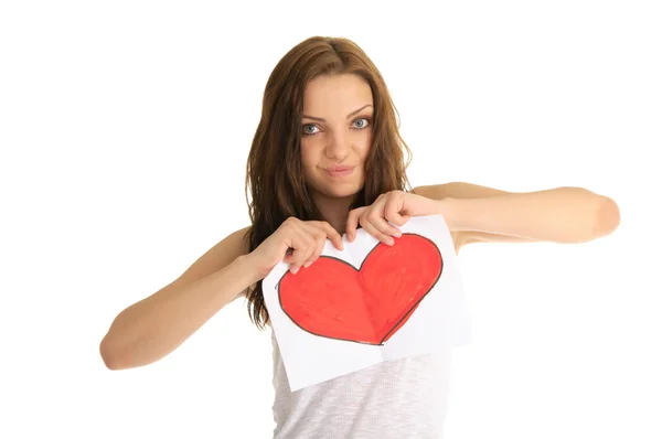 Young woman breaks the painted heart — Stock Photo, Image