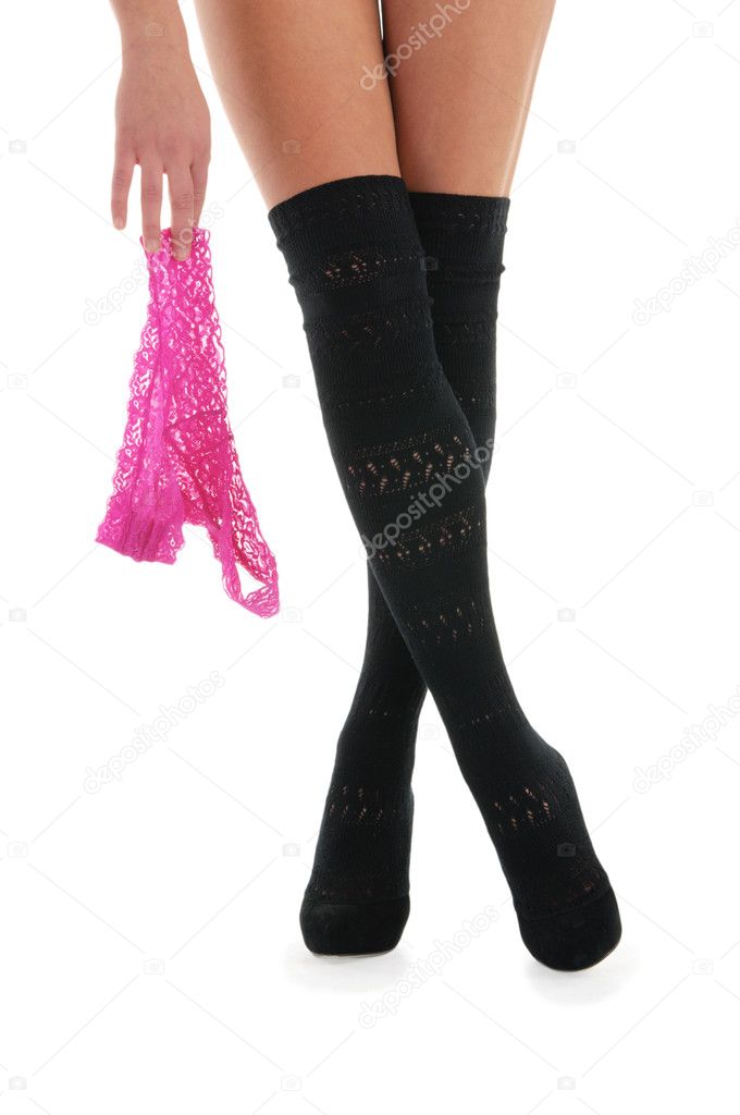 Beautiful female legs with pink panties