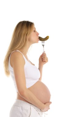 Pregnant woman eating pickles clipart