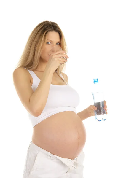Pregnant woman drinks water — Stock Photo, Image