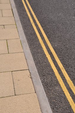 Double yellow lines on the asphalt road (forbidden parking) clipart