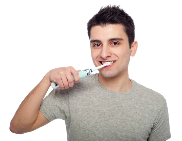 Giovane uomo lavarsi i denti — Foto Stock