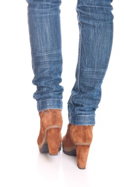 Woman legs in jeans clipart