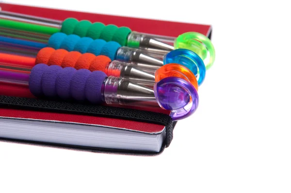 Caderno e canetas — Fotografia de Stock