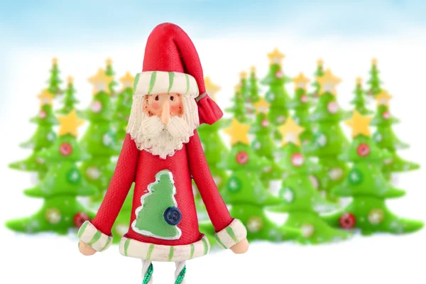 Santa Claus and Christmas trees — Stock Photo, Image
