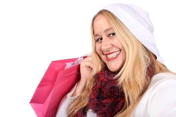 Blond dam shopper i vinter slitage — Stockfoto