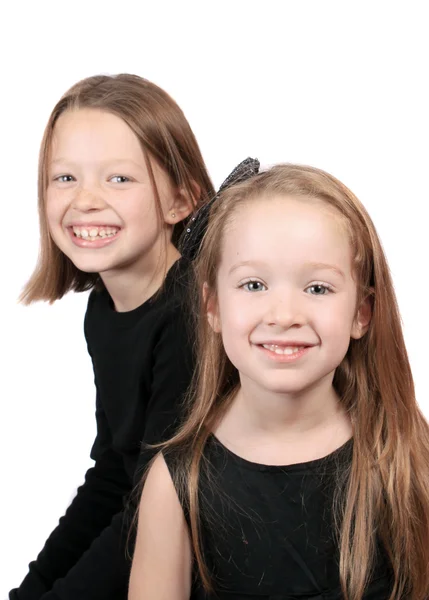 Two Pretty Girls Sisters White Background One Ten Other Years — Stock Fotó