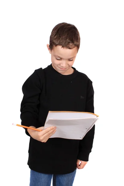 Boy with notebook and pencil — Stock Photo, Image
