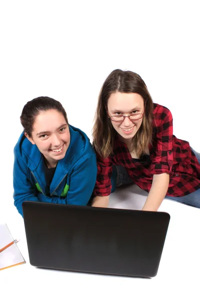 Teen girls doing homework — Stock Photo, Image