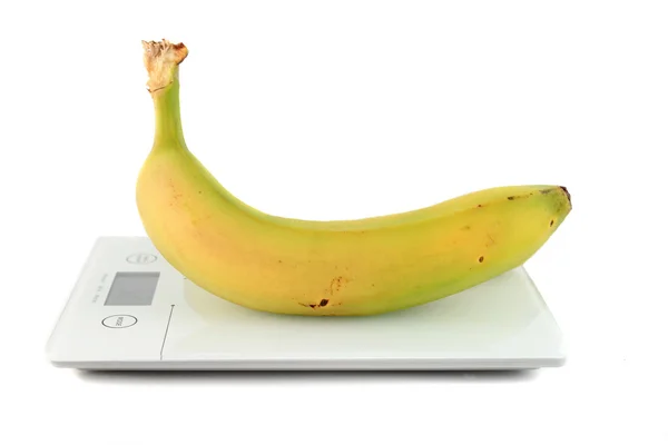 Banana na Waga kuchenna — Zdjęcie stockowe