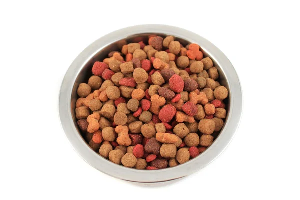 Bowl overflowing with dogfood — Stock Photo, Image