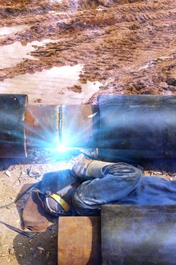 Worker welder pipe road clipart