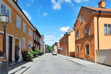 Cozy street of Uppsala clipart