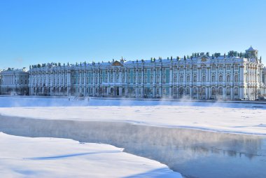 St. Petersburg. Winter Palace and Neva river in cold sunny winter day clipart