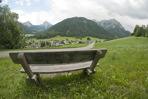 Stock image Bench on the Dolomites Mountains, Italy