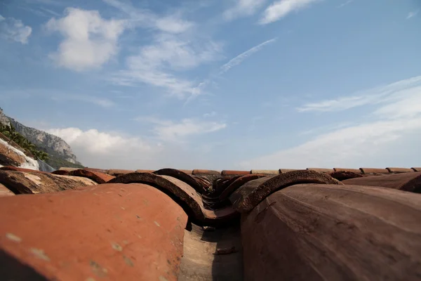 stock image A artistic view of red clay roof tiles